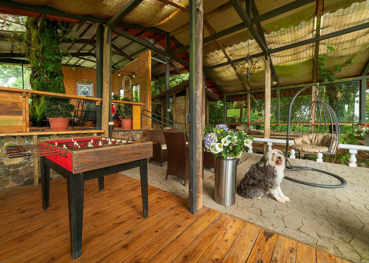 Altura Hotel Poasito Экстерьер фото